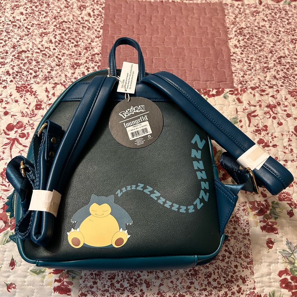 A original green Snorlax Loungefly backpack. New with tags!